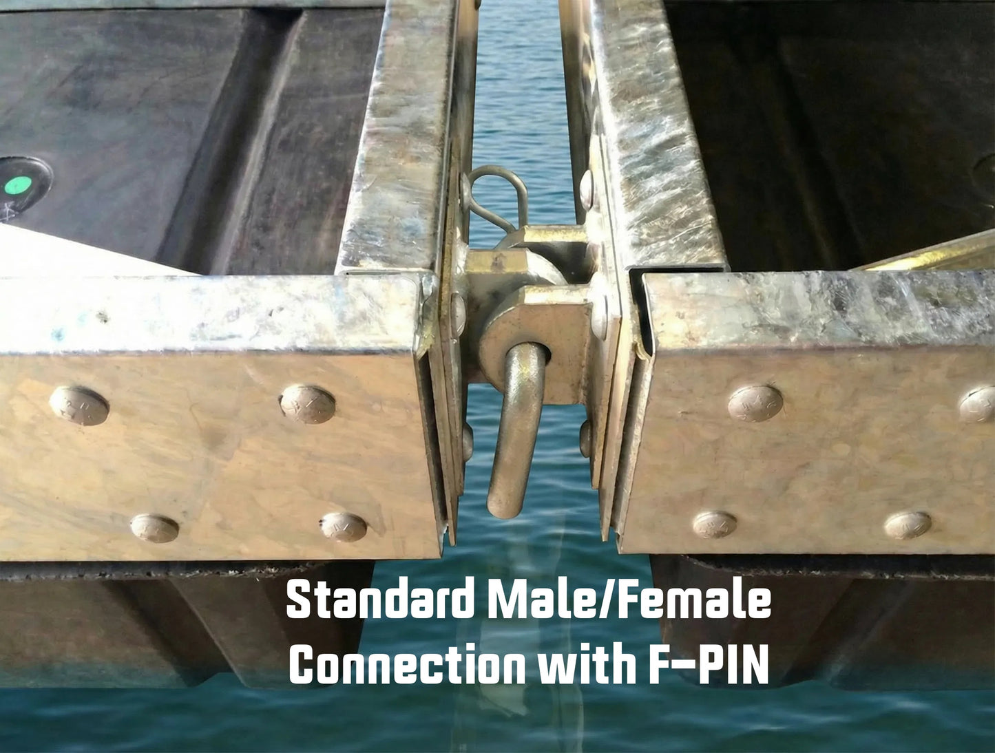 Close-up of two metal sections joined by the American Muscle Docks & Fabrication HDG Tab Connector Pin & Clip, positioned above blue water.