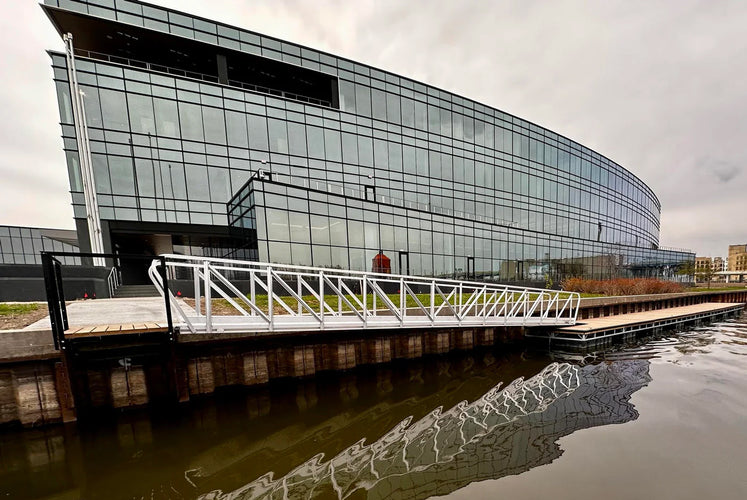 Aluminum access ramp gangway for a commercial floating dock.