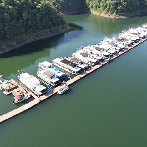 Aerial view of a marina with boats docked American Muscle Docks