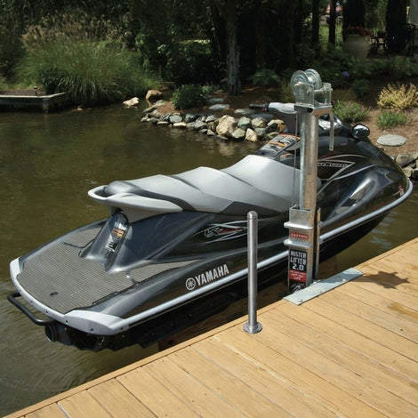 Yamaha jets ski on a Mr Lifter manual crank docked with water and greenery in the background