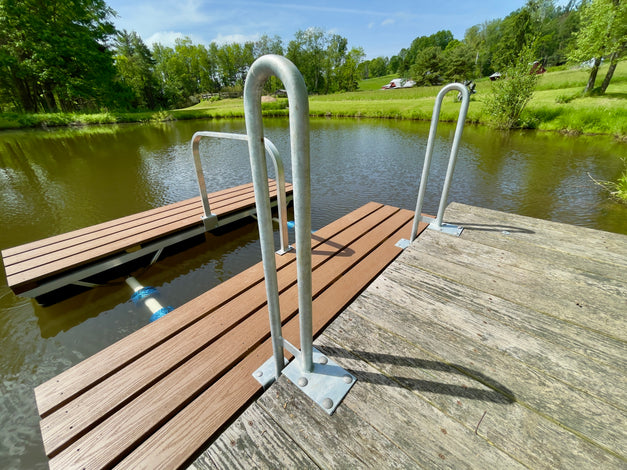kayak dock with candy canes installed on fixed pier built by American Muscle Docks