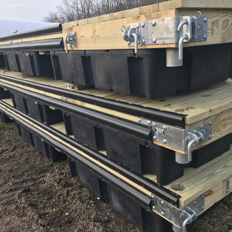 floating wood doack with heavy duty hardware and rub rails built by American Muscle Docks