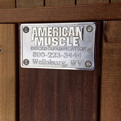 AMD plaque on wood dock decking built by American Muscle Docks