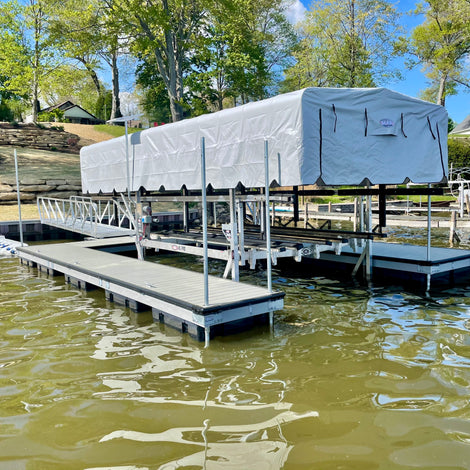 Residential Floating Dock with boat lift and gangway built by American Muscle Docks