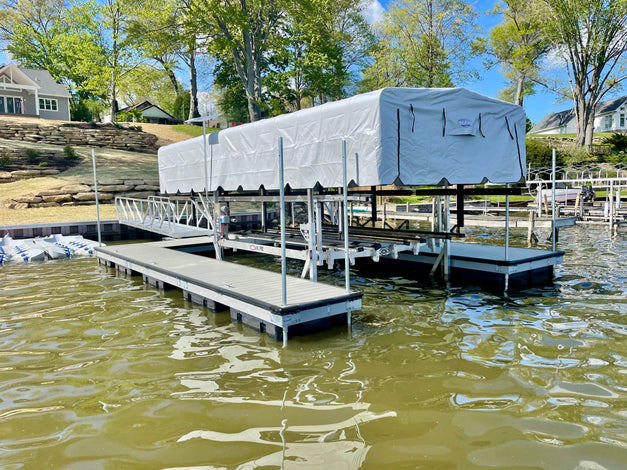 Residential Floating Dock with boat lift and gangway built by American Muscle Docks