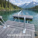 The Mr. Launcher Kayak Launch Dock by American Muscle Docks & Fabrication features metal railings and extends over a clear lake with pine trees and mountains; text reads Safe and Quick Launching.