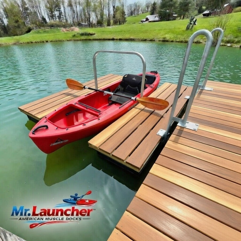 Red kayak on a wooden dock with 'Mr. Launcher' branding.