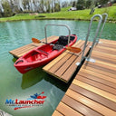 Red kayak on a wooden dock with 'Mr. Launcher' branding.