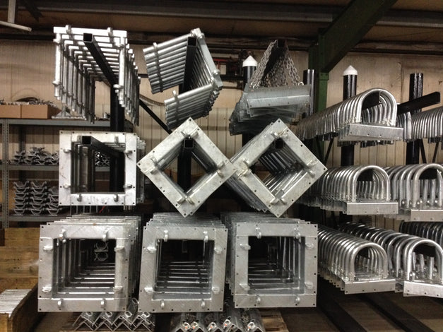 heavy duty dock hardware in warehouse on racks built by American Muscle Docks