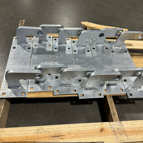Heavy duty Metal bracket assembly on a wooden pallet built by American Muscle Docks