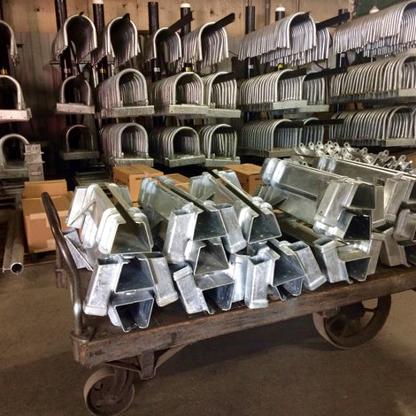 hoop pile guides on racks and mr lifter pipe track housing built by American Muscle Docks