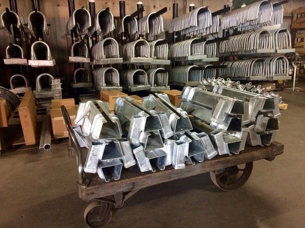 hoop pile guides on racks and mr lifter pipe track housing built by American Muscle Docks