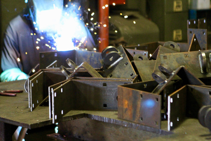 heavy duty floating boat dock parts being fabricated in house built by American Muscle Docks