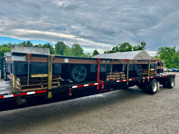 Floating boat dock with wheels for removal built by American Muscle Docks